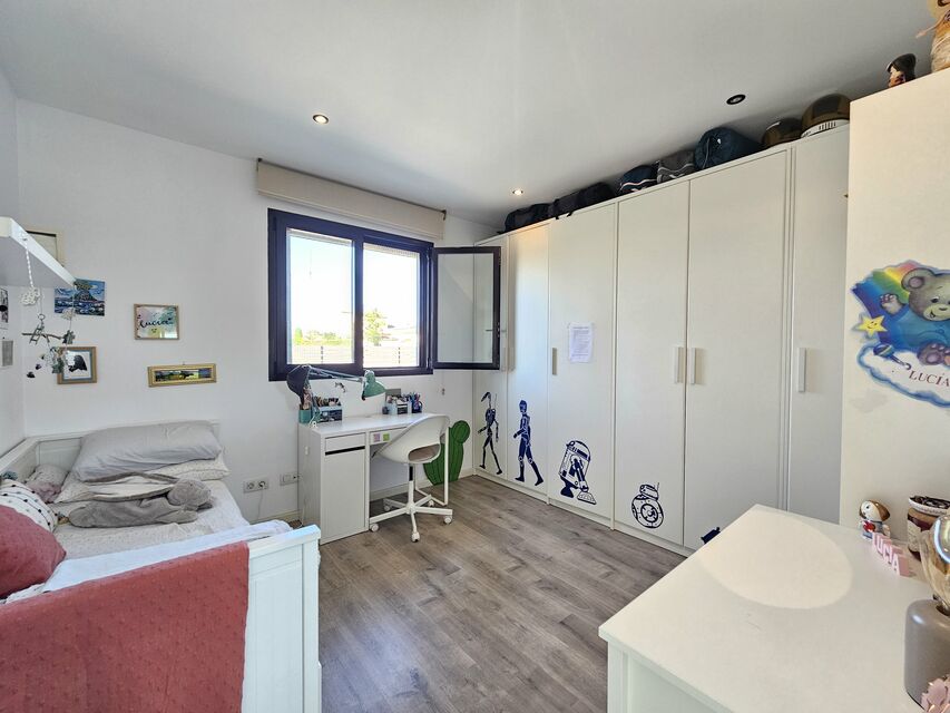 Modern ground floor villa with patio and pool